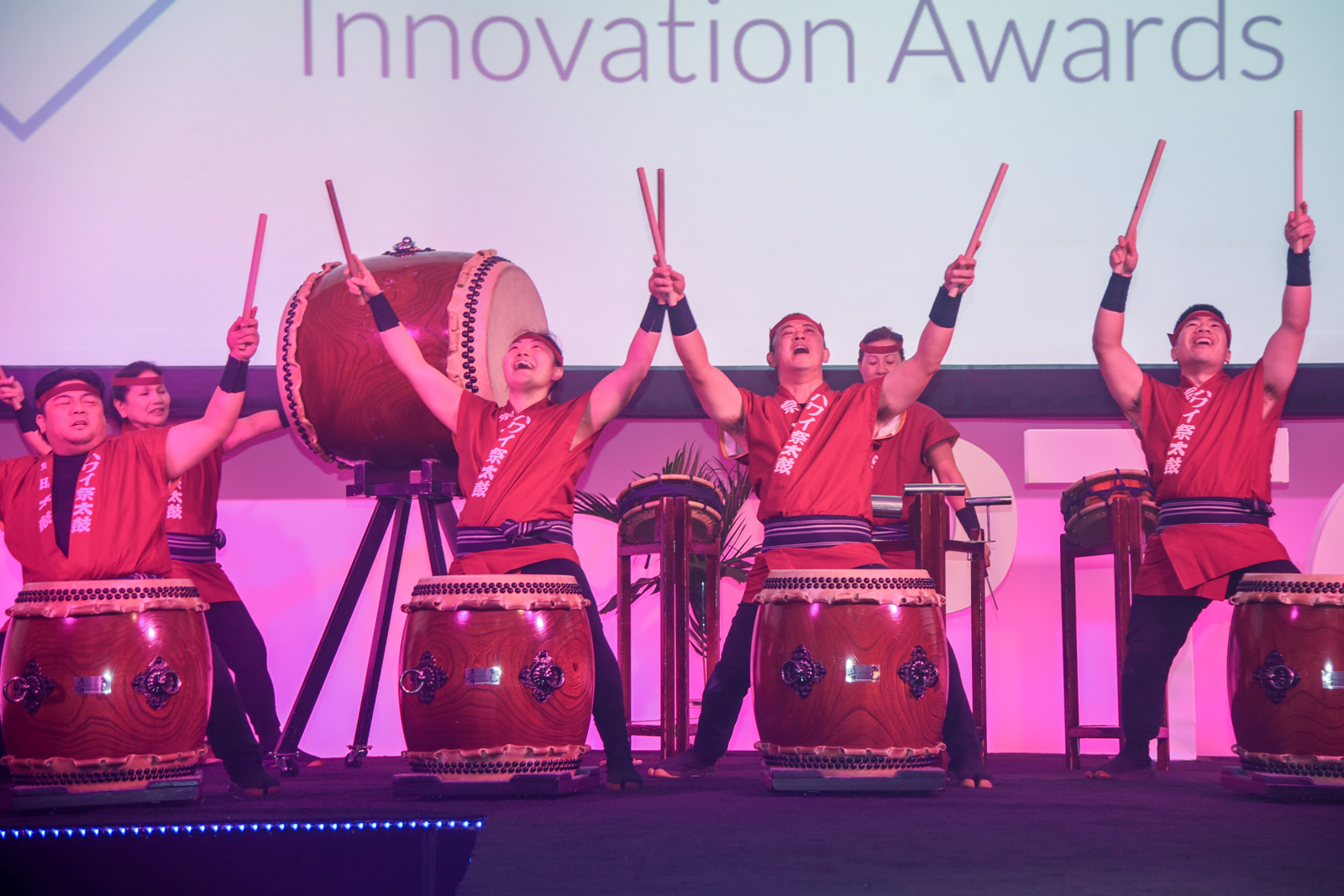 Taiko drummers performing on stage at the PTC conference Innovation Awards